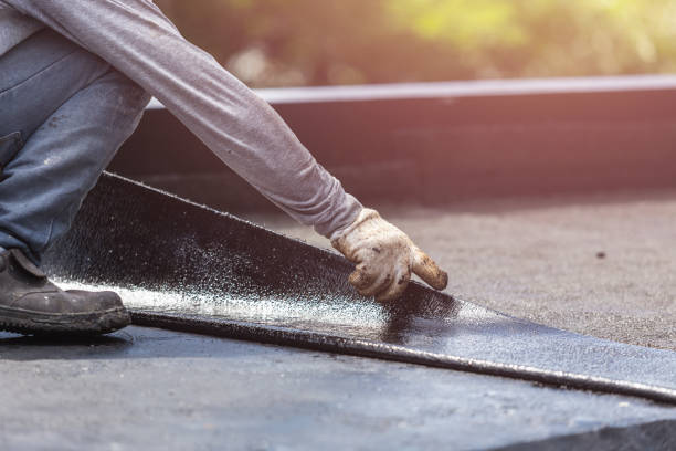 Professional Basement Waterproofing technician working in Erie, KS